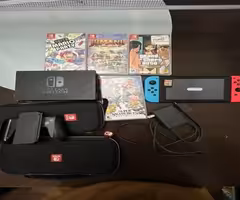 Nintendo Switch with Neon Blue and Neon Red Joy-Con With Games And Ca