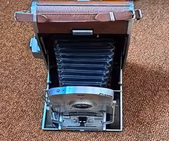 POLAROID LAND CAMERA WITH CASE AND ACCESSORIES