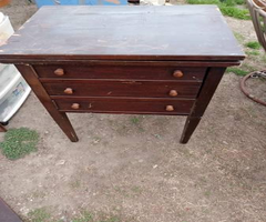 Sewing machine and table