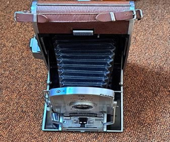 2 POLAROID LAND CAMERAS WITH CASES AND ACCESSORIES