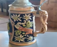 2 beautiful vintage beer steins, both are in excellent condition