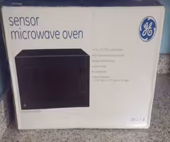 GE MICROWAVE NEW IN BOX